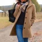 Women’s long winter coat in khaki with button-front closure and lapels
